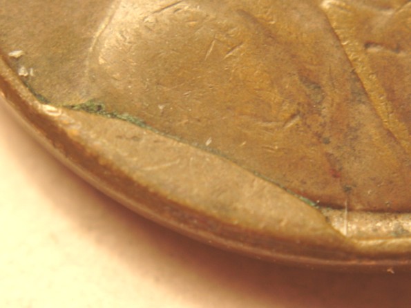 1947-P--Wheatback--Obverse-Cud